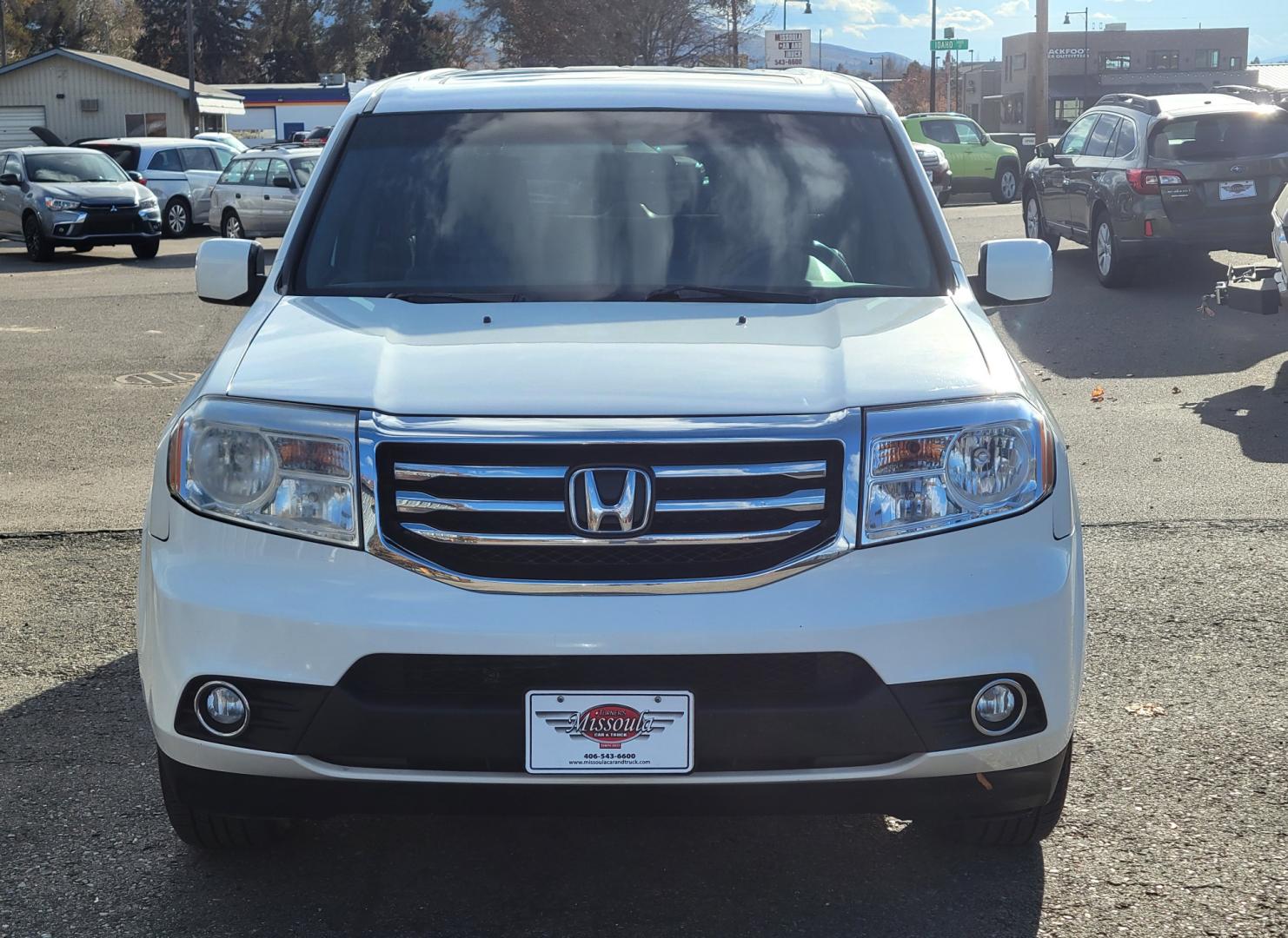 2015 White /Gray Honda Pilot EX-L AWD EX-L (5FNYF4H58FB) with an 3.5L V6 SOHC 24V engine, 5-Speed Automatic transmission, located at 450 N Russell, Missoula, MT, 59801, (406) 543-6600, 46.874496, -114.017433 - All Wheel Drive. Automatic Transmission. Power Heated Leather Seats. Power Sunroof. 3rd Row Seating. Air. Cruise. Tilt. Bluetooth. AM FM XM CD Player. Backup Camera. - Photo#2